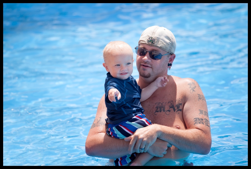 pool party swimming surf club family fun daddy son happy relax
